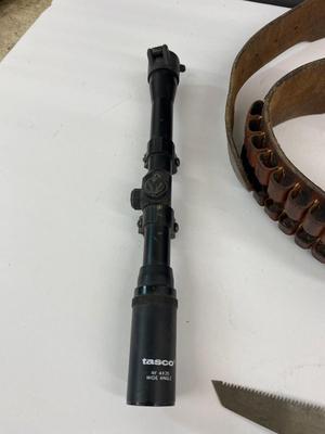 Neat Tasco Scope, with a Nifty Leather Ammo Belt. , and a Folding Saw