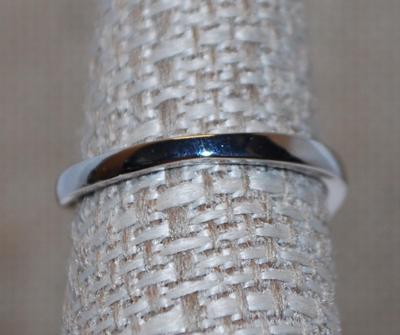 Size 7¼ Single Round Clear Stone Ring on a 