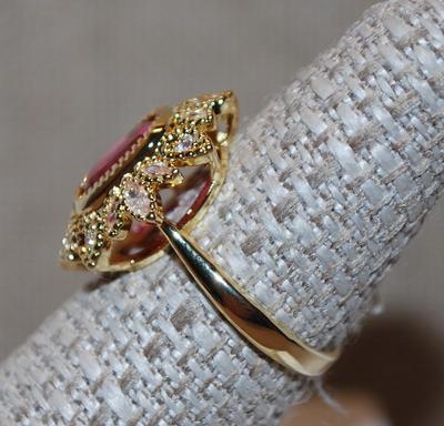 Size 7¼ Red Cushion Cut Ring in a Crown Style Setting on a Gold Tone Band (4.1g)