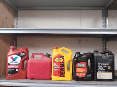 Partially full & mostly full automotive lubricants and a gas container