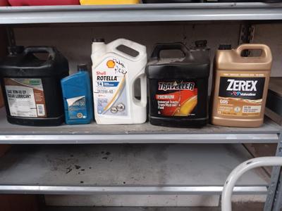 Partially full & mostly full automotive lubricants and a gas container