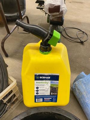 5 Gallon Yellow Fuel Can, Several Hose Remnants, drain pan and large warn Tarp