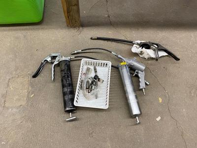 Air actuated and pistol grip grease gun with spare parts