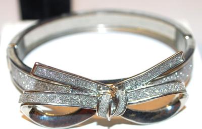 2 Bracelets - 1 Iridescent Expandable (6") & 1 Bow-Style Cuff (5") Glittery Silver Tone