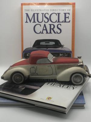 LOT 35L: Vintage 1978 Ezra Brooks Collectors Series Porcelain Auburn 1932 Car Decanter & Car Books