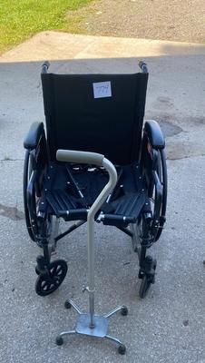 Everest and Jennings Wheelchair and a Cane