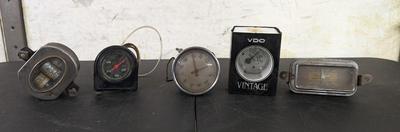 Ford Model A Oval Speedometer, Deluxe Clock, and Varied Gauges
