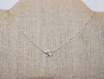 Single Round Clear Stone Cross PENDANT (1¼" x ½") with Bottom Loop on an Adjustable Necklace Chain 14"-18" L