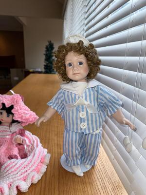 SEYMOUR MANN SAMMY PORCELAIN DOLL AND HAND CROCHETED BED PILLOW DOLL