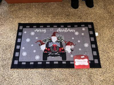 FREE STANDING SNOWMAN AND CARTOON CHARACTER, CHRISTMAS HOLIDAY RUG, LARGE WREATH AND 2 RECTANGLE PLANTERS WITH CHRISTMAS THEMED FAUX FLOWERS