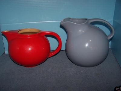LOT 13 TWO GREAT OLD POTTERY BALL PITCHERS