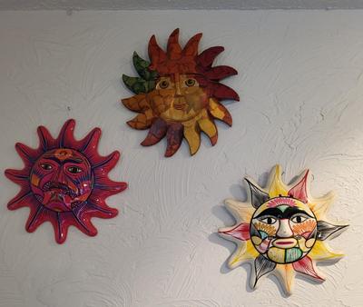 3 CLAY WALL HUNG SUNS