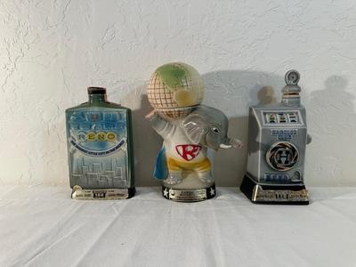 2 RENO AND AN ELEPHANT HOLDING THE WORLD JIM BEAM DECANTERS