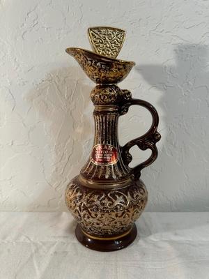 FULL 1980 SEALED GOLD TITAN DECANTER