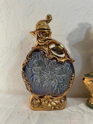 FULL JIM BEAM CHERUBS AND EMPTY GOLD AND GREEN DECANTER