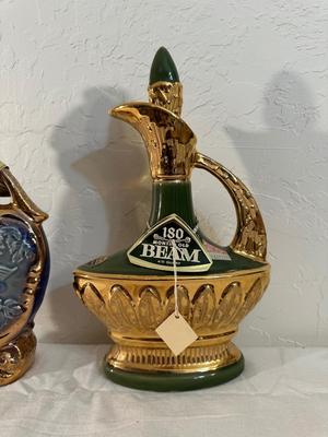 FULL JIM BEAM CHERUBS AND EMPTY GOLD AND GREEN DECANTER