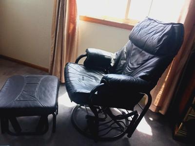 BLACK RECLINING, ROCKING AND SWIVEL CHAIR W/OTTOMAN