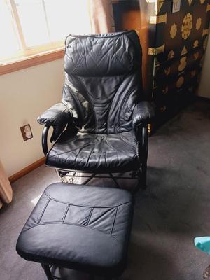 BLACK RECLINING, ROCKING AND SWIVEL CHAIR W/OTTOMAN