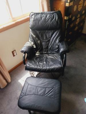 BLACK RECLINING, ROCKING AND SWIVEL CHAIR W/OTTOMAN