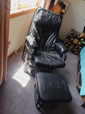 BLACK RECLINING, ROCKING AND SWIVEL CHAIR W/OTTOMAN