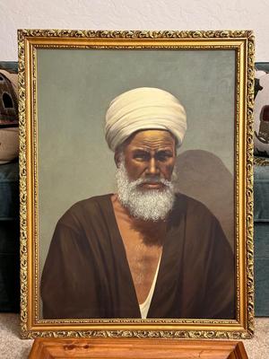 PAINTING OF AN ARAB MAN AND A WALL MIRROR