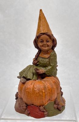 Figurine: Young Girl Seated next to Pumpkin