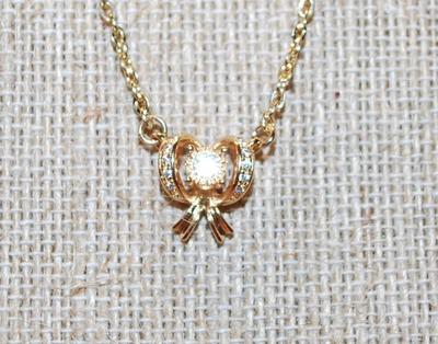 Clear Stones Array Gold Bowtie PENDANT (½