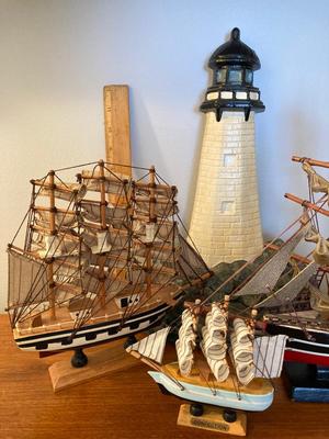 LOT 75: Cast Iron Lighthouse with Collection of Wooden Tall Ships (Flying Cloud, Confection and More)