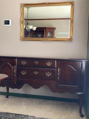 LOT 100: Wood Side / Serving Table with Decorative Gold Framed Mirror
