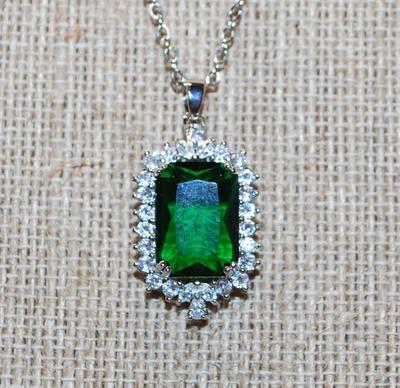 Deep Green Emerald Style Cut Stone PENDANT (1¼" x ¾") + Full Clear Stones Surround + Basket Setting on a Silver Tone Necklace...