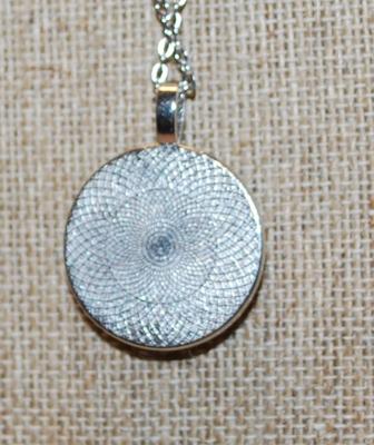 Round Graphic Designed "Sun god" PENDANT (1" Diam.) on a Silver Tone Necklace Chain 17" L