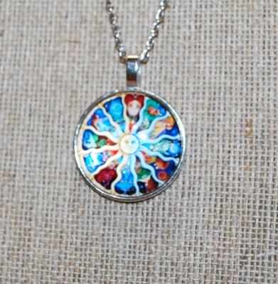 Round Graphic Designed "Sun god" PENDANT (1" Diam.) on a Silver Tone Necklace Chain 17" L