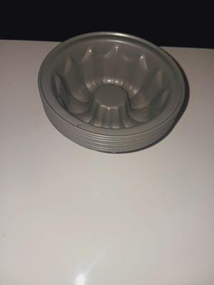 GLASS CUTTING BOARD, COOKIE PRESS, SMALL MOLDS AND LOAF PANS