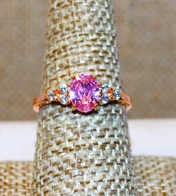 Size 8 Pink Oval Faceted Stone Ring with 3 Clear Stones Side Accents on a Rose Gold Band (2.3g)