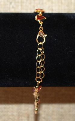 12 Red Hearts Bracelet with Gold Tone Surrounds & Chain 7" Circumference