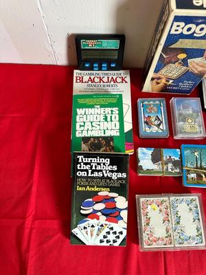 GAMES, DECKS OF CARDS AND BOOKS ON HOW TO GAMBLE