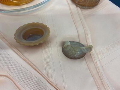 Beautiful Carnival Glass items and Miniature Nesting Hen Covered Dish with Peach Table Cloth