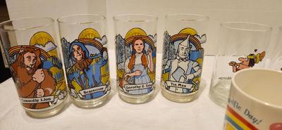 Vintage Collector glasses including four Wizard of Oz glasses