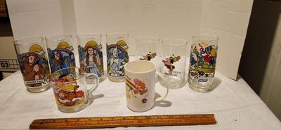 Vintage Collector glasses including four Wizard of Oz glasses