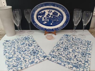 Miniature Pink glass nesting chicken with blue platter 4 stemware glasses and 2 table mats.