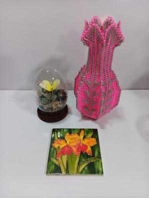Vintage Taxidermy Butterfly in a cloche dome with Lillies on a tile and a pink decorative vase
