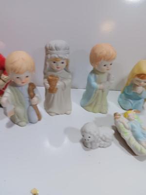 Porcelain Christmas nativity set with vintage Mrs. Claus