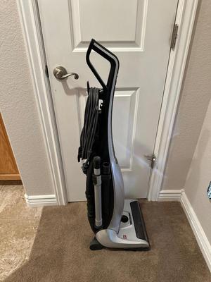 KENMORE ALL FLOORS VACUUM W/DIRT SENSOR AND HEPA FILTRATION PLUS REPLACEMENT BAGS