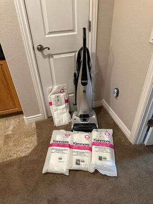 KENMORE ALL FLOORS VACUUM W/DIRT SENSOR AND HEPA FILTRATION PLUS REPLACEMENT BAGS
