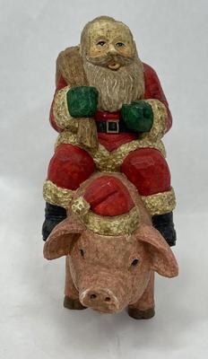 Santa Riding Pig Figurine