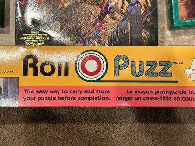 JIGSAW PUZZLES AND A ROLL PUZZ