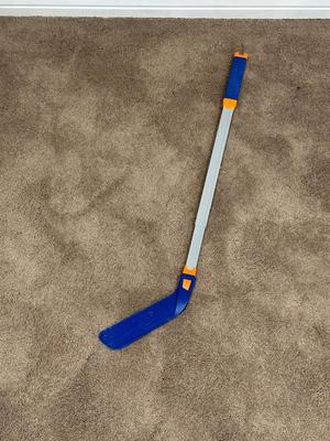 BASKETBALL, PLASTIC HOCKEY STICK AND KNEE PADS