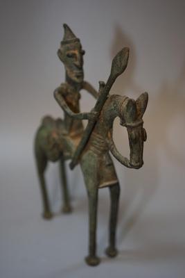 AFRICAN METAL SCULPTURE DECORATIVE OF HUNTER ON HORSE