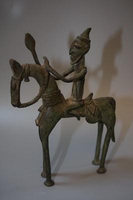 AFRICAN METAL SCULPTURE DECORATIVE OF HUNTER ON HORSE