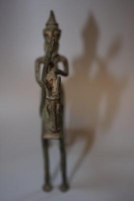 AFRICAN METAL SCULPTURE DECORATIVE OF HUNTER ON HORSE
